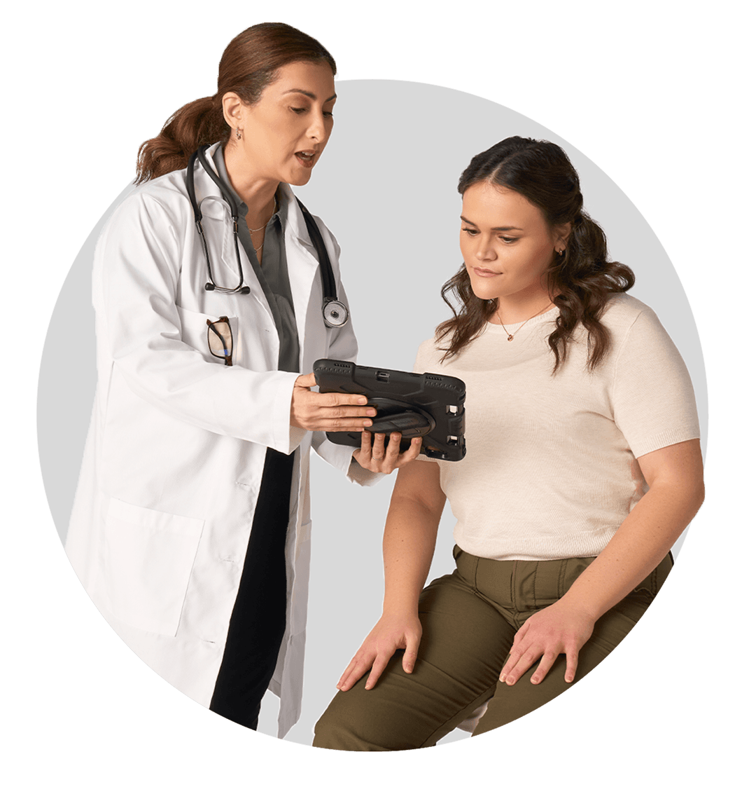 Doctor discussing CRENESSITY with a patient
