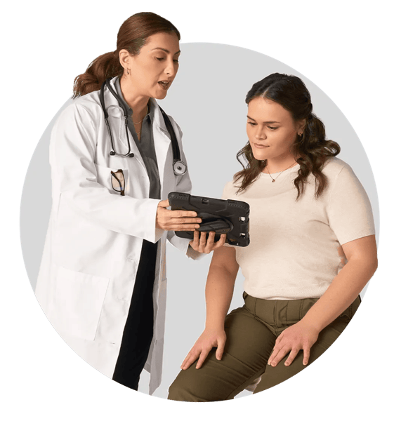 Doctor discussing CRENESSITY with a patient