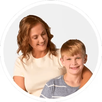 Kristy and her son Grant, who has classic CAH and is taking CRENESSITY